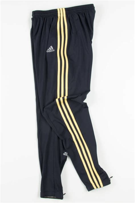 adidas originals three stripe track pants in navy and yellow